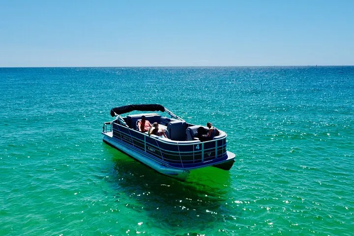 A self-drive pontoon boat on St. Andrews Bay for a Shell Island pontoon rental from Panama City Beach, Florida